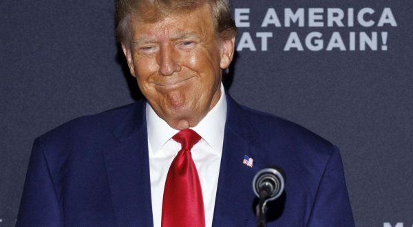 epa10791193 Republican candidate for President Former US President Donald Trump addresses a crowd of supporters during a rally at Windham High School in Windham, New Hampshire, USA, 08 August 2023.  EPA/CJ GUNTHER