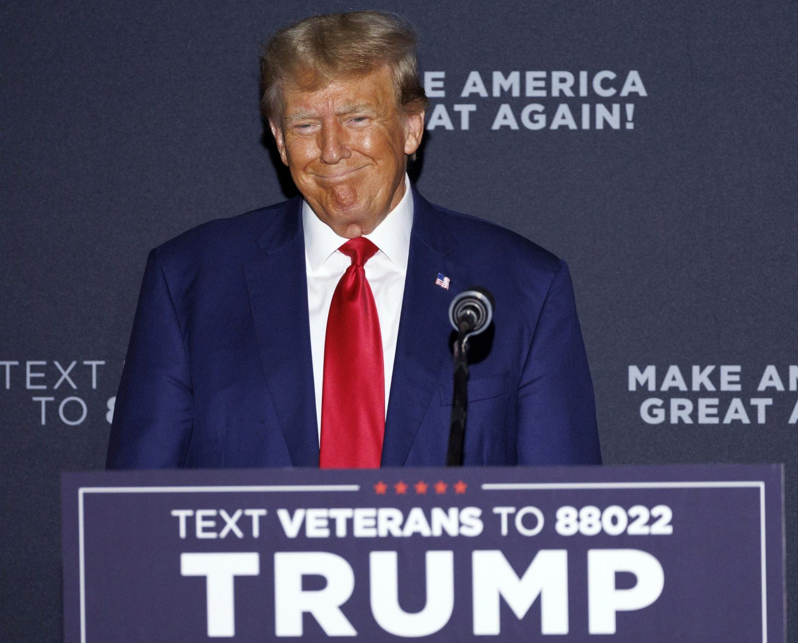epa10791193 Republican candidate for President Former US President Donald Trump addresses a crowd of supporters during a rally at Windham High School in Windham, New Hampshire, USA, 08 August 2023.  EPA/CJ GUNTHER