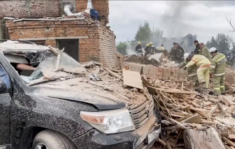 epa10792056 A photo taken from handout video provided  by the Russian Emergencies Ministry's press service shows emergency personnel working at the site of a blast at the Zagorsk Optical and Mechanical Plant in Sergiev Posad (about 68 kilometers from Moscow), Moscow Region, Russia, 09 August 2023. At least 45 people were injured and a complete evacuation of all buildings and workshops was announced at the plant. Violation of safety standards is the main reason for the explosion at the plant, said Olga Vradiy, a representative of the regional head of the investigative committee. 'The incident happened at 10:40 in a metal hangar of 40x40 meters. This is a pyrotechnics warehouse, which was rented by a private company on the territory of the Zagorsk Optical and Mechanical Plant,' the Moscow region governor Andrey Vorobyov added.  EPA/RUSSIAN EMERGENCIES MINISTRY HANDOUT HANDOUT EDITORIAL USE ONLY/NO SALES HANDOUT EDITORIAL USE ONLY/NO SALES