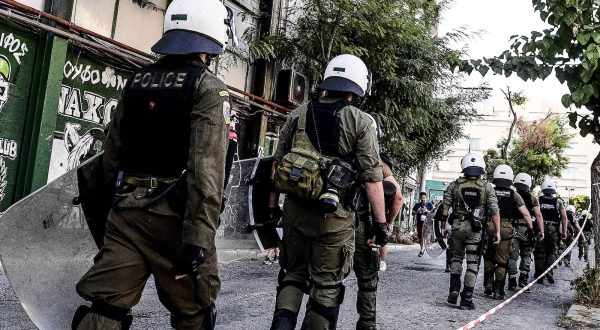 epa10792204 Riot police guards the area outside the stadium prior to the UEFA Champions League third qualifying round, 1st leg soccer match between Panathinaikos and Marseille in Athens, Greece, 09 August 2023.  EPA/PANAGIOTIS MOSCHANDREOU