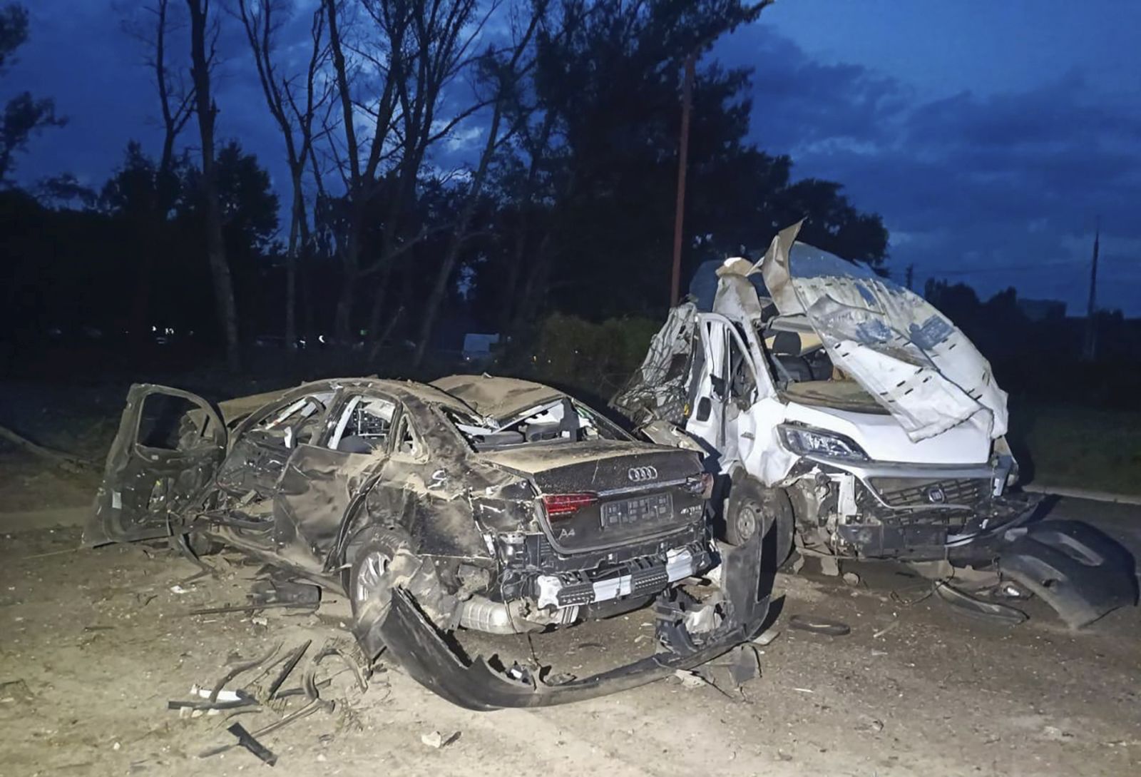 epa10793943 A handout photo made available by the National Police of Ukraine shows damaged vehicles in the aftermath of a rocket strike in Zaporizhzhia, Ukraine, 10 August 2023, amid the Russian invasion. At least one person died and 14 others were injured, the Zaporizhzhia City Council reported.  EPA/National Police of Ukraine HANDOUT HANDOUT  HANDOUT EDITORIAL USE ONLY/NO SALES