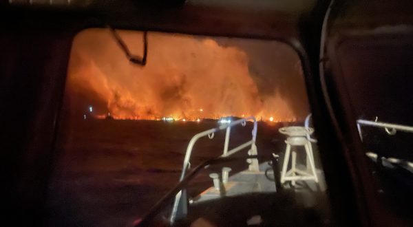 epa10795148 A handout photo made available by the United States Coast Guard (USCG) shows USCG crews responding from the ocean to the Lahaina wildfires in Maui, Hawaii, USA, 09 August 2023 (issued 11 August 2023). According to Coast Guard Station Maui, a total of 17 lives were saved from the water and 40 survivors were located ashore by boat crews. At least 53 people were killed in the wildfires buring in Maui, which is considered the largest natural disaster in Hawaii's state history, according to a statement by Hawaii Governor Josh Green. Hundreds of buildings on the island were destroyed and thousands of people were evacuated. On 10 August, US President Biden declared Hawaii wildfires a 'major disaster' and ordered federal aid to supplement state and local recovery efforts in the affected areas.  EPA/PO3 DAVID GRAHAM/US COAST GUARD HANDOUT -- BEST QUALITY AVAILABLE -- HANDOUT EDITORIAL USE ONLY/NO SALES