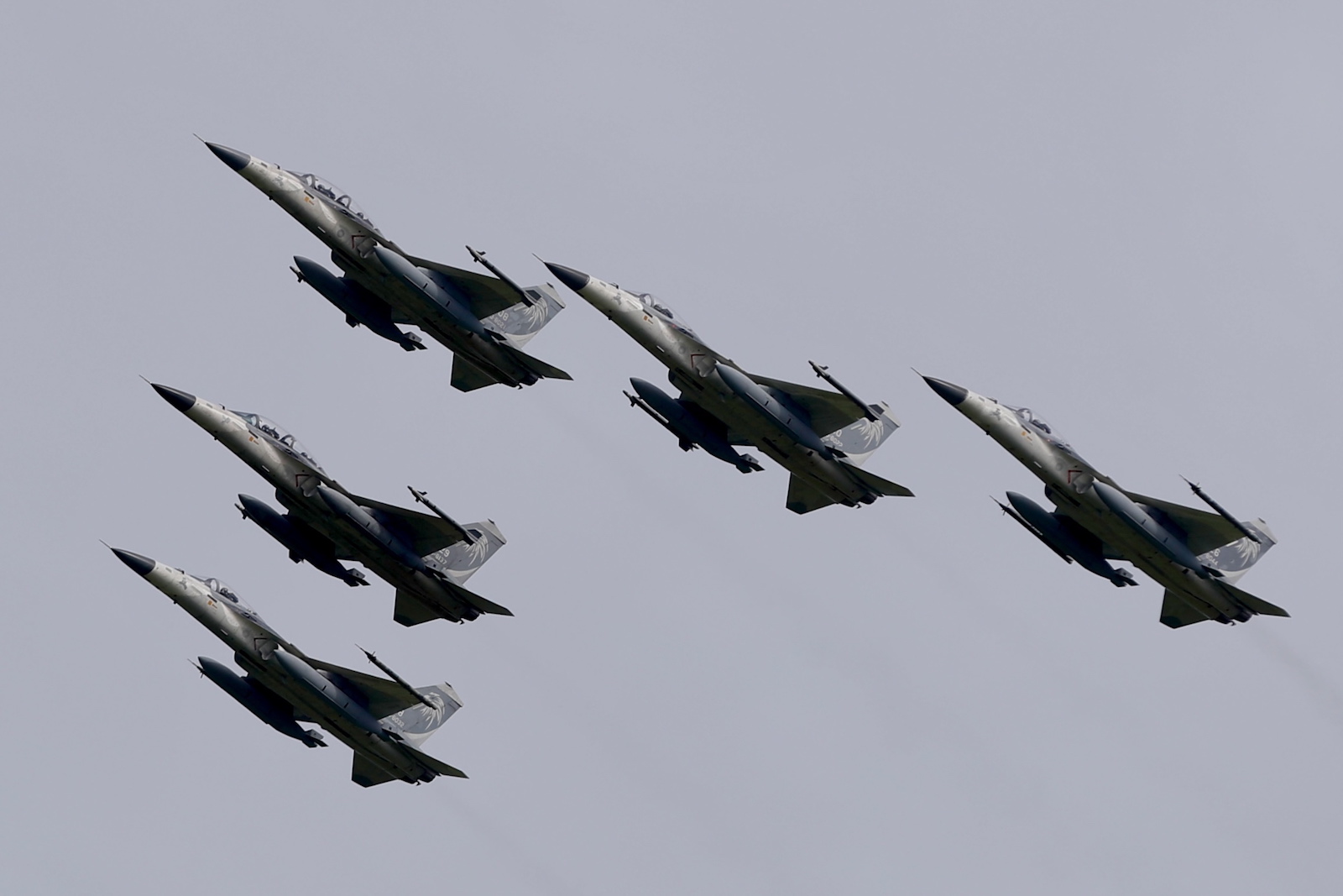 epa10796324 Taiwan's made Indigenous Defense Fighter jets fly by during an open house event inside Taiwanese Air Base in Taichung, Taiwan, 12 August 2023. China stated on 11 August that it will conduct three days of military drills in the East China Sea, one day before Taiwan Vice President William Lai is supposed to leave for a trip to Paraguay with a stopover in the USA.  EPA/RITCHIE B. TONGO