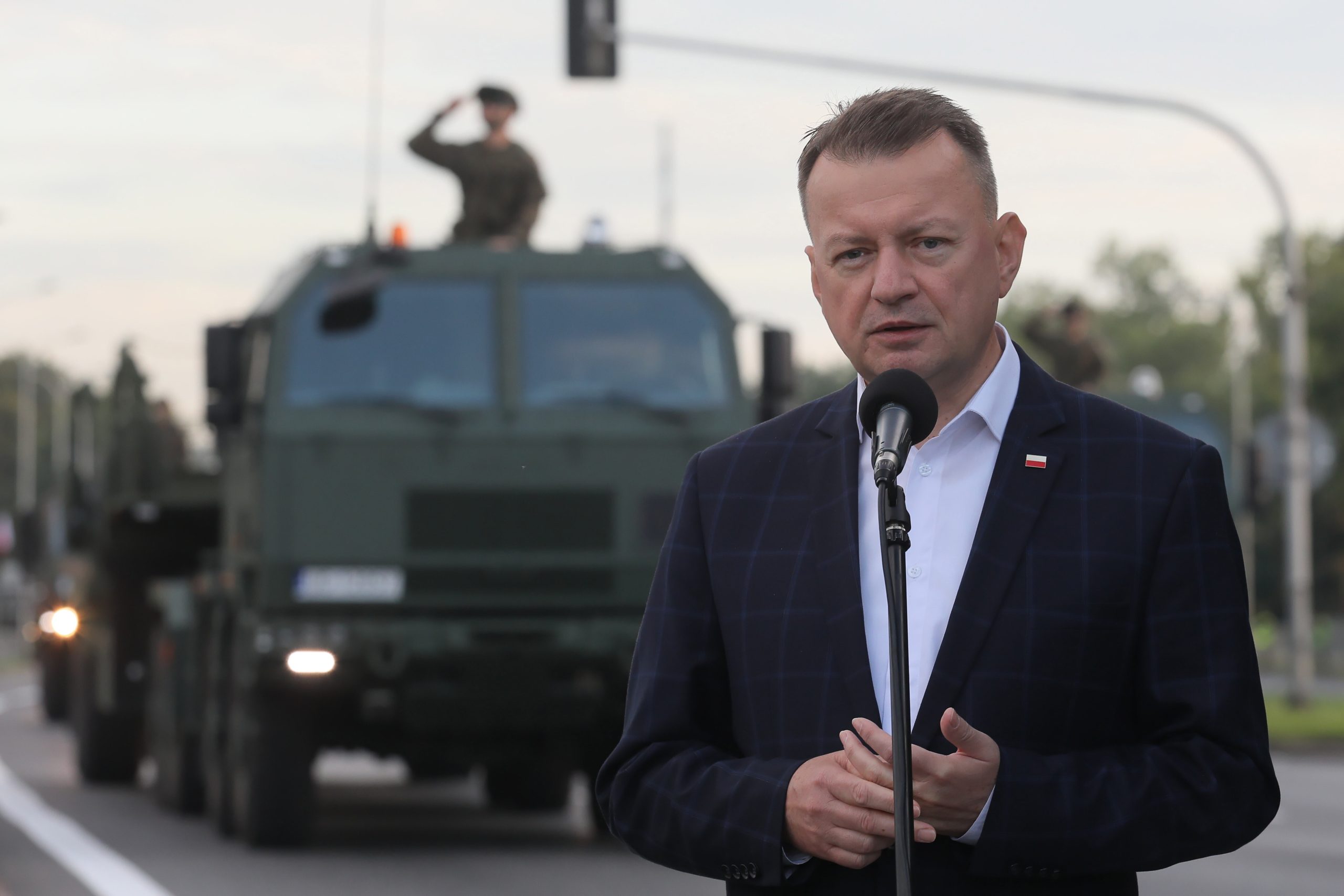 epa10798272 Polish Defense Minister Mariusz Blaszczak speaks during a press conference after the final rehearsal of a parade, prior to the Polish Armed Forces Day, in Warsaw, Poland, 13 August 2023. Over 2,000 soldiers, tanks, armoured vehicles, airplanes and helicopters will take part in the Grand Polish Armed Forces Parade which will take place in Warsaw on 15 August.  EPA/Pawel Supernak POLAND OUT