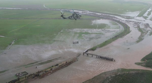 epa10799318 An undated photo released by the official North Korean Central News Agency (KCNA) on 14 August 2023 shows a typhoon-hit area during a visit of North Korean leader Kim Jong Un in Ogye-ri, Anbyon County of Kangwon Province, North Korea. According to KCNA, the downpour and tidal wave caused by Typhoon No. 6, broke down the embankments of rivers and caused 200-odd hectares of farmland to come under water in some areas of Kangwon Province some days ago.  EPA/KCNA   EDITORIAL USE ONLY