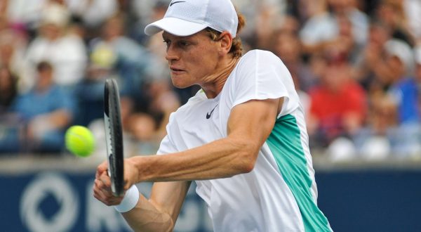 epa10799253 Jannik Sinner of Italy in action against Alex De Minaur of Australia during the men's final match at the 2023 National Bank Open tennis tournament in Toronto, Canada, 13 August 2023.  EPA/EDUARDO LIMA