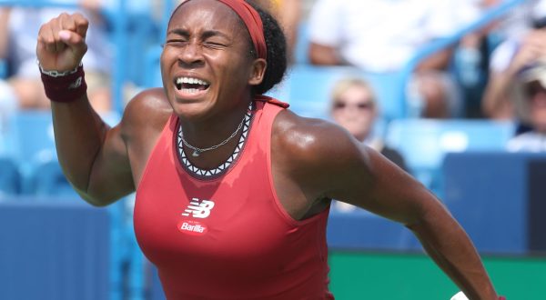 epa10807785 Coco Gauff of the United States  celebrates winning the first set during her semi-final match against Iga Swiatek of Poland at the Western and Southern Open tennis tournament in Mason, Ohio, USA, 19 August 2023.  EPA/MARK LYONS