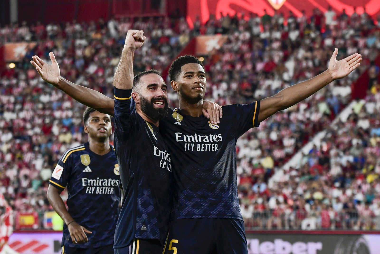 epa10808134 Real Madrid's Jude Bellingham (R) celebrates after scoring during a Spanish LaLiga EA Sports soccer match between UD Almeria and Real Madrid at Power Horse Stadium in Almeria, southern Spain, 19 August 2023.  EPA/Carlos Barba
