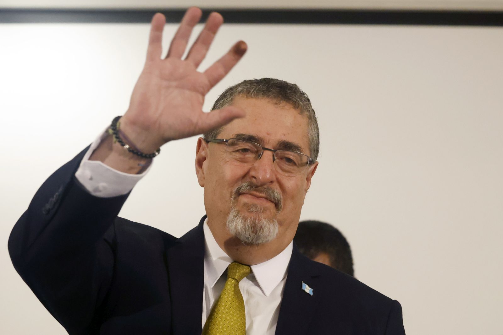 epa10811228 Guatemalan president-elect Bernardo Arevalo waves following his election win, in Guatemala City, Guatemala 20 August 2023. The 64-year-old academic Bernardo Arevalo de Leon, from the progressive political group, was elected on 20 August as the new president of Guatemala after beating former first lady Sandra Torres Casanova in the elections.  EPA/Esteban Biba