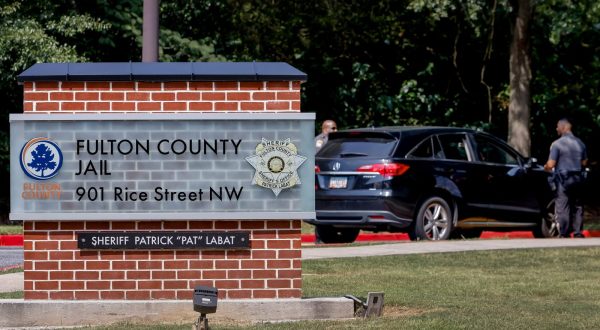 epa10814488 Fulton County Sheriff deputies provide security outside the Fulton County Jail after a grand jury indictment against former US President Donald Trump and 18 co-defendants for 2020 election interference in Atlanta, Georgia, USA, 22 August 2023. Defendants in the case have until noon on 25 August 2023 to surrender at the jail. Fulton County District Attorney Fani Willis announced the criminal charges against former President Trump and the others in an alleged sweeping and wide-ranging criminal conspiracy.  EPA/ERIK S. LESSER
