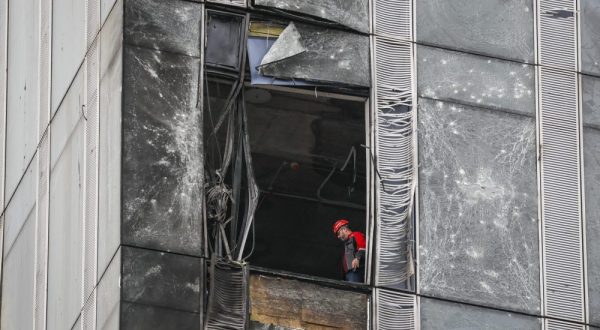 epaselect epa10814856 A worker inside a damaged building in the Moscow-City business center after a drone reportedly fell, in Moscow, Russia, 23 August 2023. The Russian Defence Ministry reported that the air defense forces stopped an attempt by Ukraine to carry out an attack by three unmanned aerial vehicles in Moscow. ‘Two of the drones were destroyed by air defense in the air over the territory of Mozhaisk and Khimki districts of the Moscow region. The third UAV was suppressed by electronic warfare and, having lost control, collided with the building of the Moscow City business center,’ the Russian Defence Ministry said.  EPA/YURI KOCHETKOV
