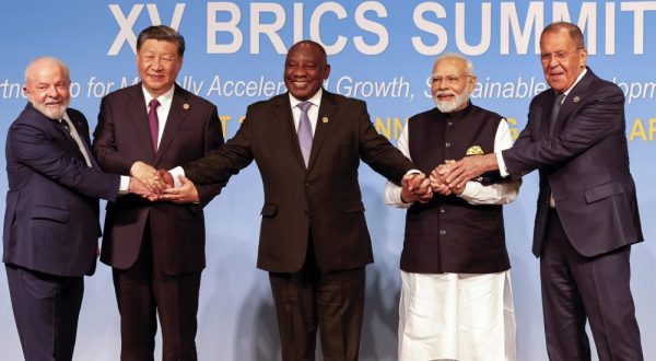 epa10815047 (L-R) President of Brazil Luiz Inacio Lula da Silva, President of China Xi Jinping, South African President Cyril Ramaphosa, Prime Minister of India Narendra Modi and Russia's Foreign Minister Sergei Lavrov pose for a BRICS family photo during the 2023 BRICS Summit at the Sandton Convention Centre in Johannesburg, South Africa, 23 August 2023. South Africa is hosting the 15th BRICS Summit, (Brazil, Russia, India, China and South Africa), as the group’s economies account for a quarter of global gross domestic product. Dozens of leaders of other countries in Africa, Asia and the Middle East are also attending the summit.  EPA/GIANLUIGI GUERCIA / POOL