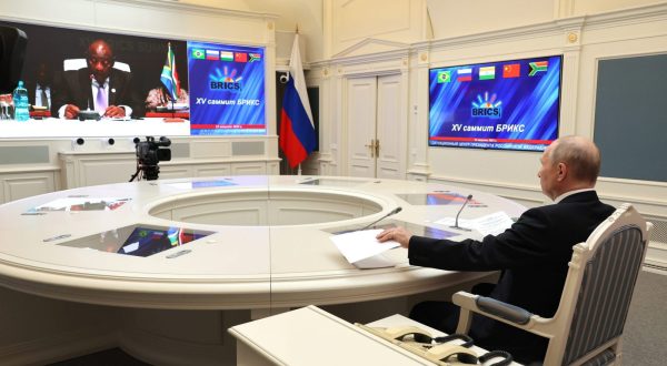 epa10815530 Russian President Vladimir Putin (R) attends the 15th BRICS Summit via video link in Moscow, Russia, 22 August 2023 (Issued on 23 August 2023). South Africa is hosting the 15th BRICS Summit, (Brazil, Russia, India, China and South Africa), as the group's economies account for a quarter of global gross domestic product. Dozens of leaders of other countries in Africa, Asia and the Middle East are also attending the summit.  EPA/MIKHAEL KLIMENTYEV / SPUTNIK / KREMLIN POOL