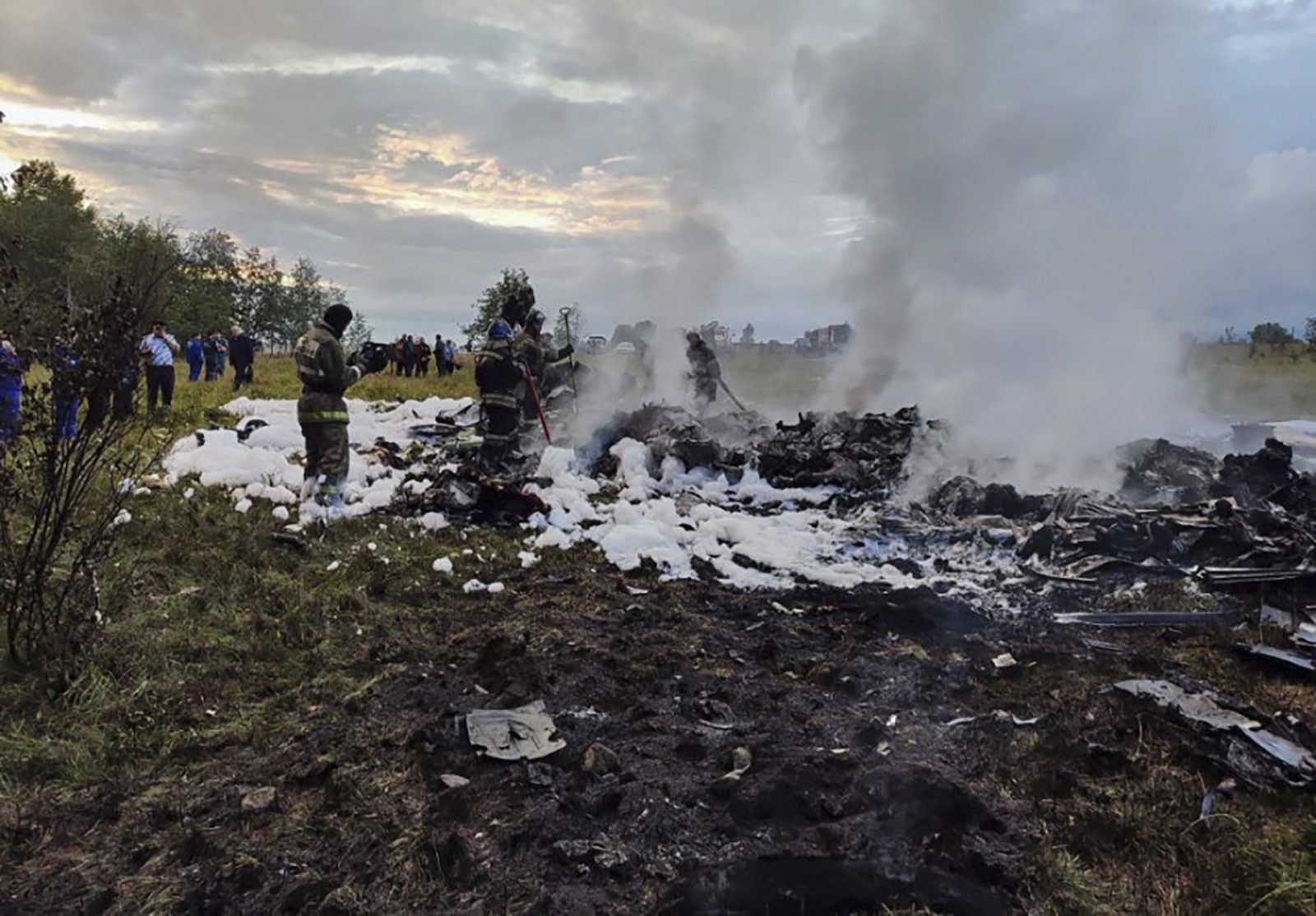 epa10816489 A handout picture made available by Russian Investigative Committee shows Russian emergency service work on the site of the plane crash near the village of Kuzhenkino, Tver region, Russia, 23 August 2023. An investigation was launched into the crash of an aircraft in the Tver region in Russia on 23 August 2023, the Russian Federal Air Transport Agency said in a statement. Among the passengers was Yevgeny Prigozhin, the agency reported.  EPA/RUSSIAN INVESTIGATIVE COMMITEE HANDOUT  HANDOUT EDITORIAL USE ONLY/NO SALES