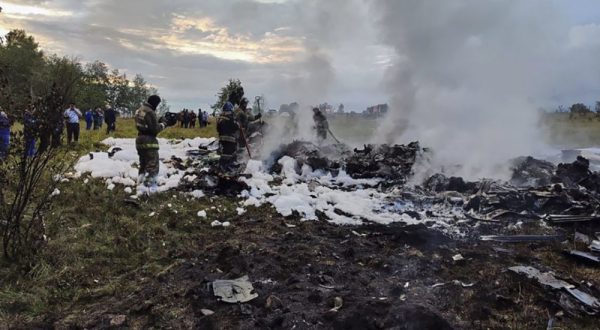 epa10816489 A handout picture made available by Russian Investigative Committee shows Russian emergency service work on the site of the plane crash near the village of Kuzhenkino, Tver region, Russia, 23 August 2023. An investigation was launched into the crash of an aircraft in the Tver region in Russia on 23 August 2023, the Russian Federal Air Transport Agency said in a statement. Among the passengers was Yevgeny Prigozhin, the agency reported.  EPA/RUSSIAN INVESTIGATIVE COMMITEE HANDOUT  HANDOUT EDITORIAL USE ONLY/NO SALES