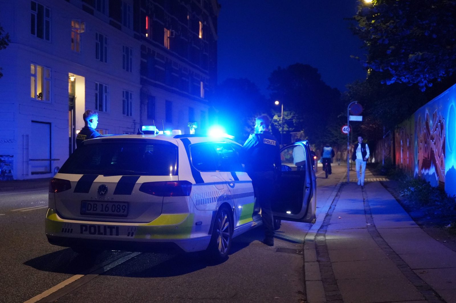 epa10822303 Police secure a shooting scene outside Freetown Christiania in Copenhagen, Denmark, 26 August 2023. Authorities confirmed that several people have been shot at Christiania, a popular tourist attraction as well as one of the only places in Denmark where cannabis is sold openly.  EPA/EMIL HELMS  DENMARK OUT