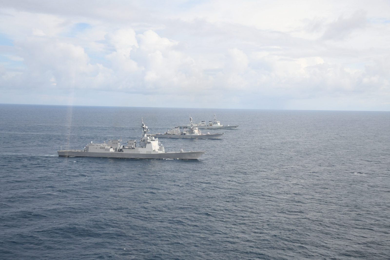 epa10826413 A handout photo made available by the South Korean Navy shows three Aegis-equipped destroyers, the Japan Maritime Self-Defense Force's JS Haguro (front), the US' USS Benfold (C) and South Korea's ROKS Yulgok Yi I, sailing in the international waters south of the southern island of Jeju, 29 August 2023, as South Korea, the US and Japan stage a trilateral missile defense exercise in response to North Korea's purported space rocket launch the week before.  EPA/SOUTH KOREAN NAVY/HANDOUT SOUTH KOREA OUT HANDOUT EDITORIAL USE ONLY/NO SALES