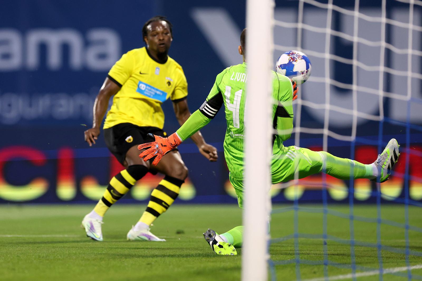 15.08.2023., stadion Maksimir, Zagreb - Prva utakmica 3. pretkola UEFA Lige prvaka, GNK Dinamo - AEK. Levi Garcia, Dominik Livakovic  Photo: Goran Stanzl/PIXSELL