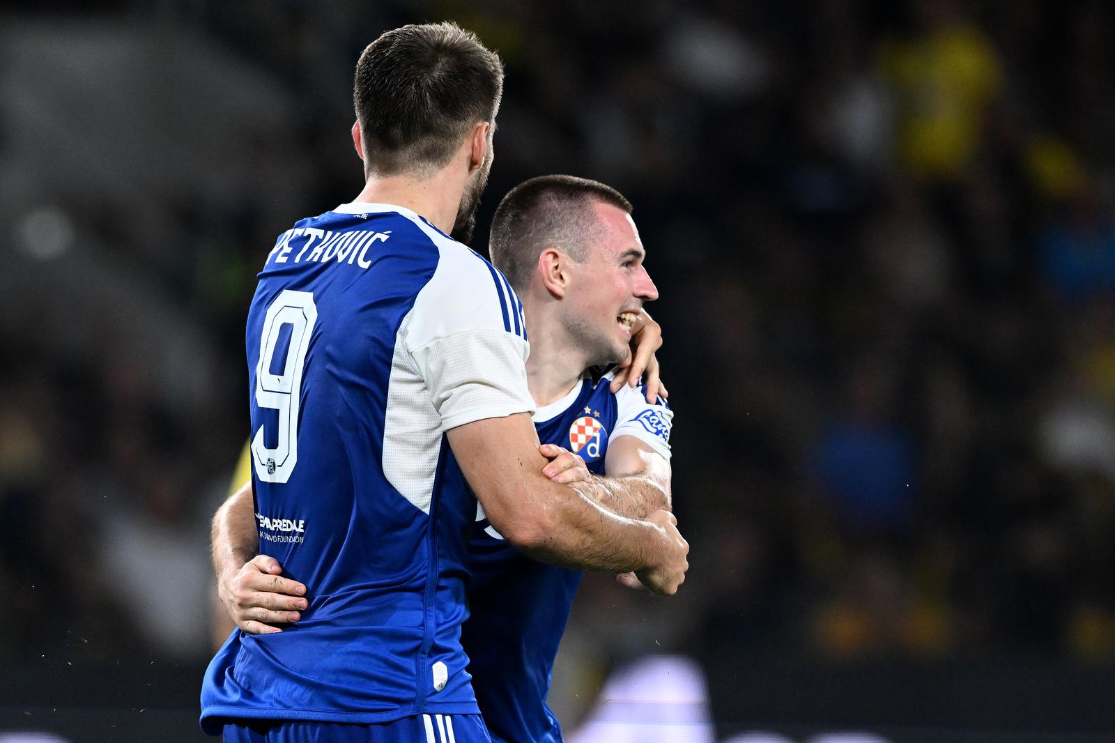 19.08.2023., Atena, Grcka - Utakmica 3. pretkola UEFA Lige prvaka, AEK - GNK Dinamo. Bogdan Mihajlicenko, Bruno Petkovic Photo: Marko Lukunic/PIXSELL