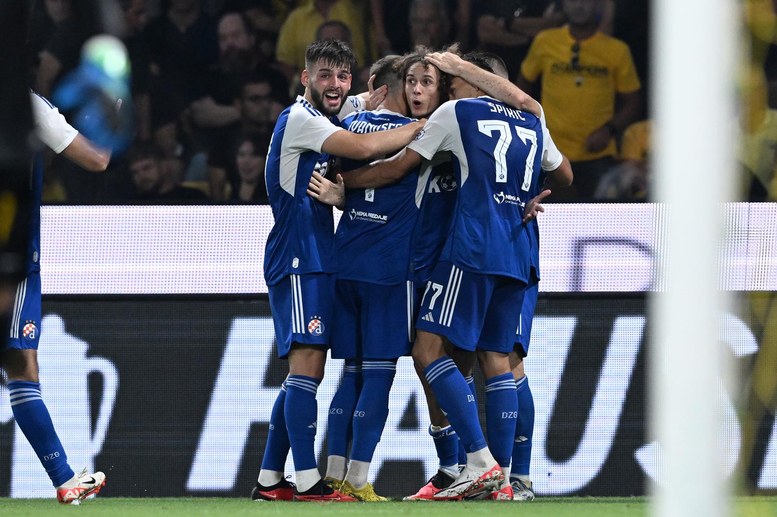 19.08.2023., Atena, Grcka - Utakmica 3. pretkola UEFA Lige prvaka, AEK - GNK Dinamo. Robert Ljubicic, Marko Bulat, Dario Spikic Photo: Marko Lukunic/PIXSELL