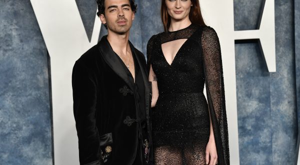 Joe Jonas, left, and Sophie Turner arrive at the Vanity Fair Oscar Party on Sunday, March 12, 2023, at the Wallis Annenberg Center for the Performing Arts in Beverly Hills, Calif. (Photo by Evan Agostini/Invision/AP)