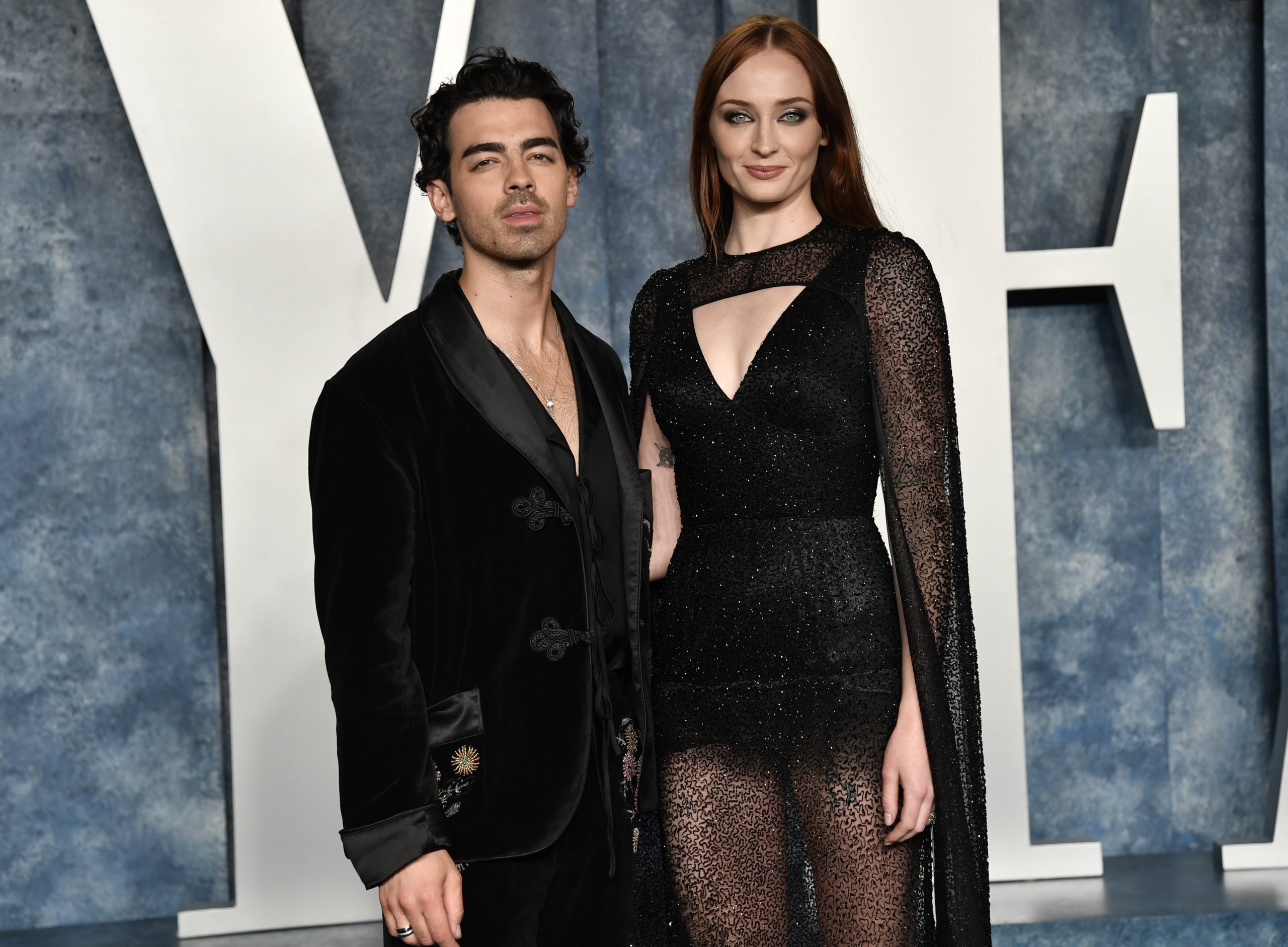Joe Jonas, left, and Sophie Turner arrive at the Vanity Fair Oscar Party on Sunday, March 12, 2023, at the Wallis Annenberg Center for the Performing Arts in Beverly Hills, Calif. (Photo by Evan Agostini/Invision/AP)