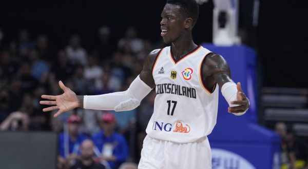 Germany guard Dennis Schroder (17) reacts to a call during the championship game of the Basketball World Cup against Serbia in Manila, Philippines, Sunday, Sept. 10, 2023. (AP Photo/Michael Conroy)