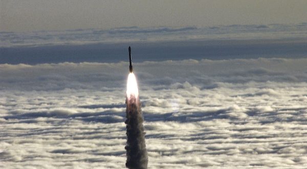 A Boeing Delta II rocket soars above the clouds over Vandenberg Air Force Base (AFB), California, carrying a National Aeronautics and Space Administration (NASA) Earth Observing System (EOS) set of satellites designed to monitor ocean levels and measure other environmental sciences.