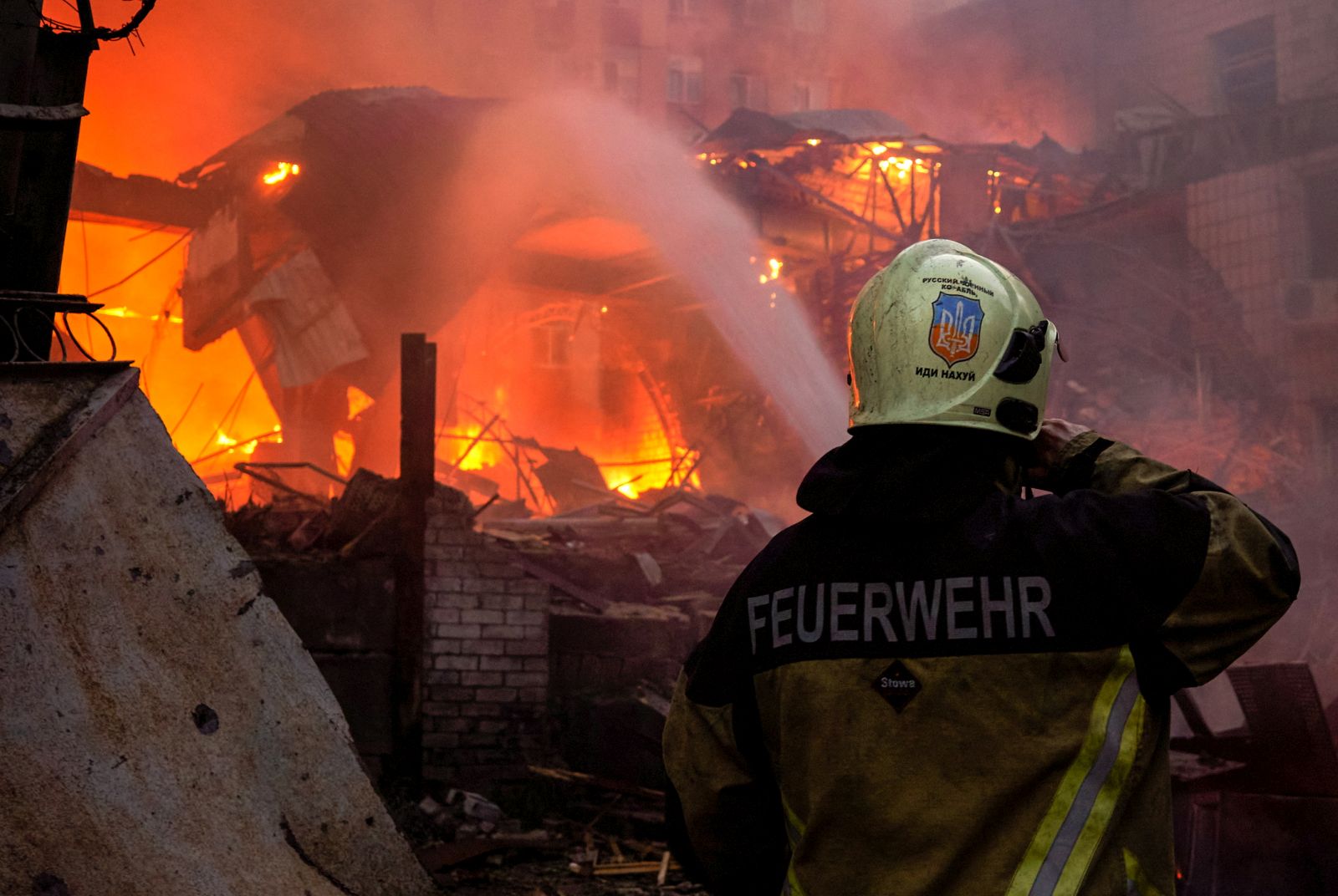 epaselect epa10828161 A firefighter works at the site of a missile strike in Kyiv (Kiev), Ukraine, 30 August 2023. Russian forces attacked Kyiv the night of 30 August killing two people and injuring another, Kyiv City Military Administration Head Serhii Popko reported. Russian troops entered Ukrainian territory in February 2022, starting a conflict that has provoked destruction and a humanitarian crisis.  EPA/VADYM SARAKHAN