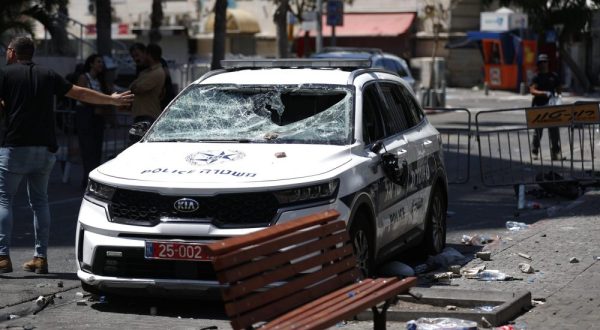 epa10835544 A view of a damaged Israeli police vehicle after clashes between opponents of the Eritrean regime and the Israeli police in Tel Aviv, Israel, 02 September 2023. The protest was againt a pro-Eritrean regime conference due to be held at the Eritrean embassy in Israel on 02 September. The confrence is part of many others organized by Eritrean embassies worldwide with violent reactions to it a few times as well. According to Israeli medical sources, some 35 protesters and 12 policemen were injured in the clashes.  EPA/ATEF SAFADI