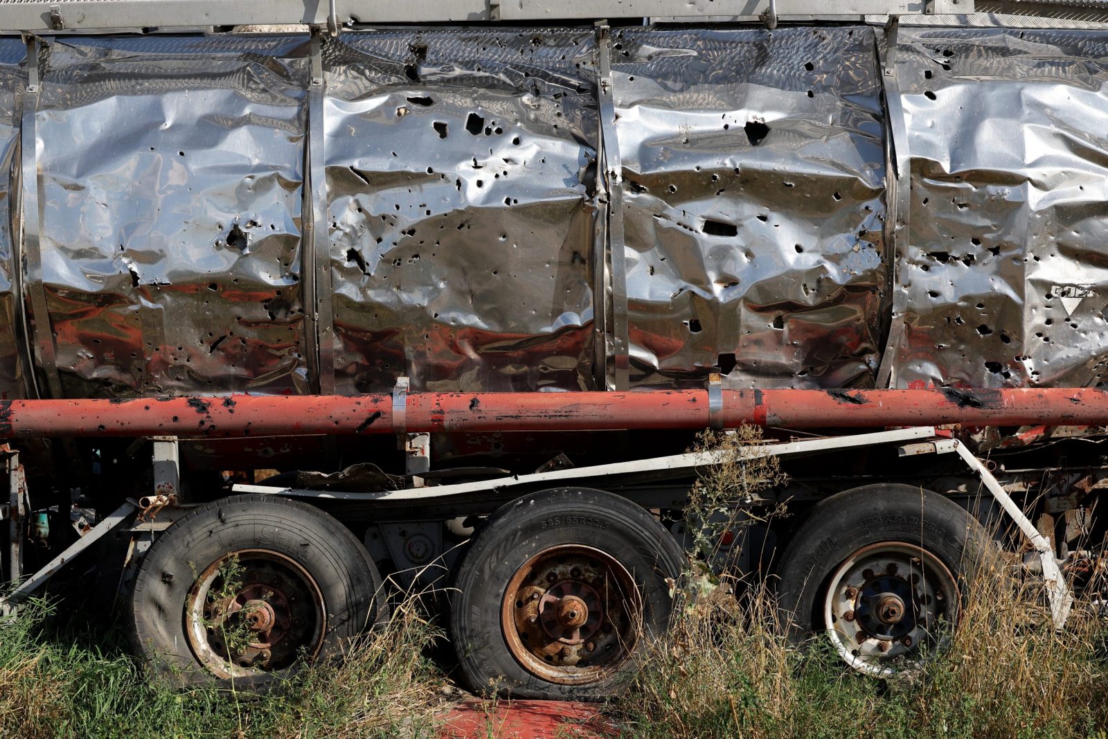 epa10836194 Farming machinery destroyed with shrapnel seen in the village of Dovhenke, Ukraine, 2 September 2023. Russian troops entered Ukraine in February 2022 starting a conflict that has provoked destruction and a humanitarian crisis.  EPA/CATHAL MCNAUGHTON