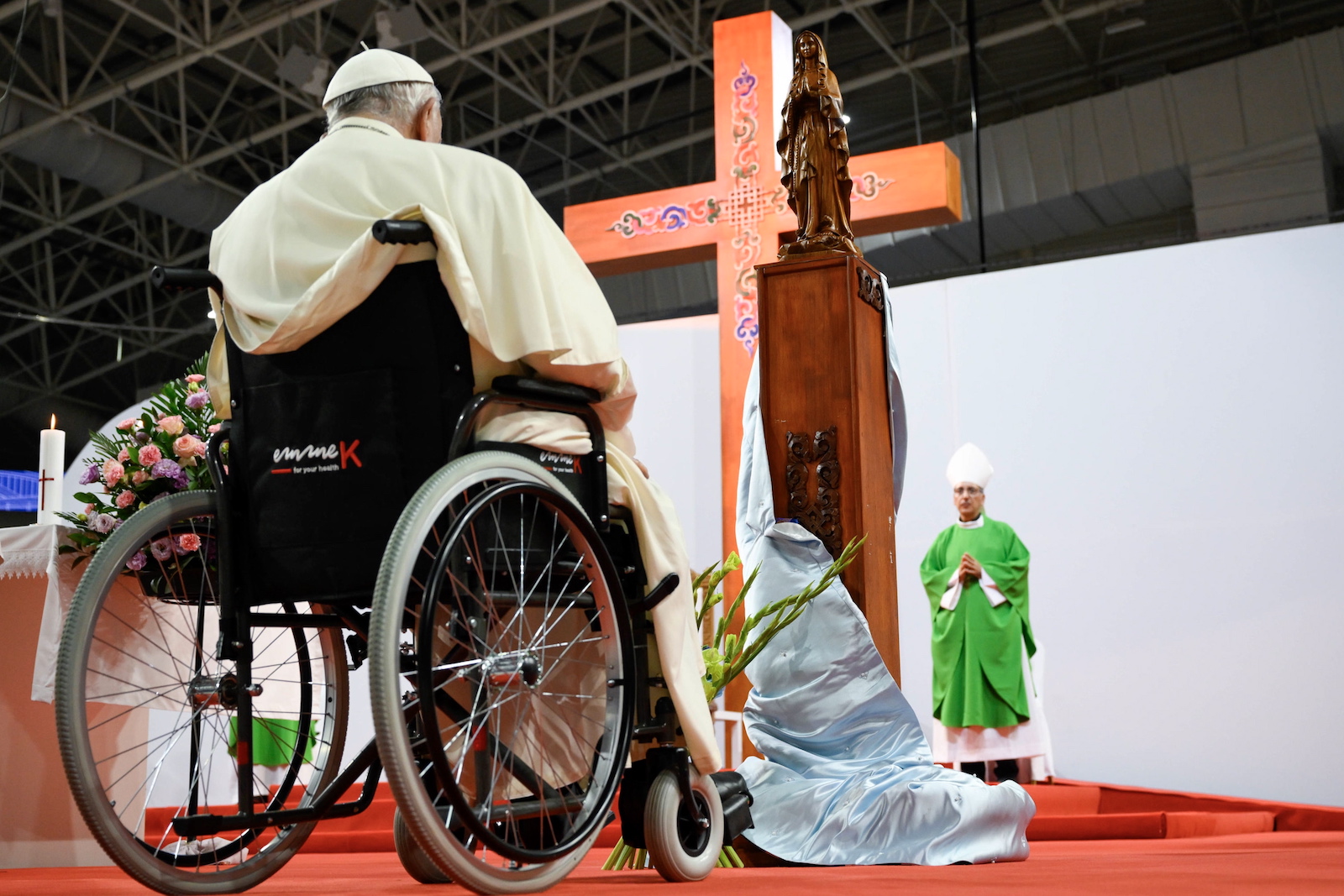 epa10837460 A handout photo made available by Vatican Media shows Pope Francis (L) leading a Holy Mass at the 'Steppe arena' sports stadium, in the city of Ulaanbaatar, Mongolia, 03 September 2023. Pope Francis on 01 September landed in Mongolia's capital Ulaanbaatar to start his 43rd international apostolic journey to Mongolia, under the motto 'Hoping Together', until 04 September.  EPA/VATICAN MEDIA / HANDOUT  HANDOUT EDITORIAL USE ONLY/NO SALES