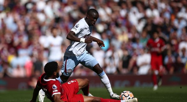epa10837790 Joe Gomez of Liverpool and Moussa Diaby of Aston Villa in action during the English Premier League soccer match between Liverpool FC and Aston Villa FC in Liverpool, Britain, 03 September 2023.  EPA/ADAM VAUGHAN EDITORIAL USE ONLY. No use with unauthorized audio, video, data, fixture lists, club/league logos or 'live' services. Online in-match use limited to 120 images, no video emulation. No use in betting, games or single club/league/player publications.
