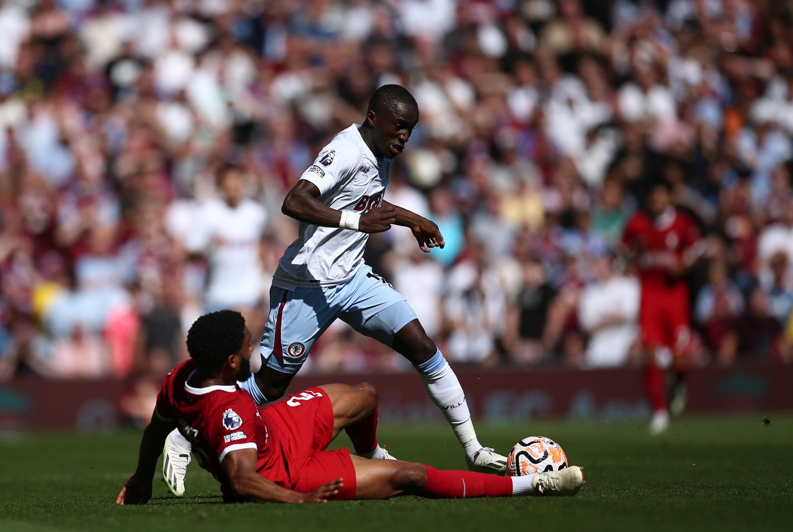 epa10837790 Joe Gomez of Liverpool and Moussa Diaby of Aston Villa in action during the English Premier League soccer match between Liverpool FC and Aston Villa FC in Liverpool, Britain, 03 September 2023.  EPA/ADAM VAUGHAN EDITORIAL USE ONLY. No use with unauthorized audio, video, data, fixture lists, club/league logos or 'live' services. Online in-match use limited to 120 images, no video emulation. No use in betting, games or single club/league/player publications.
