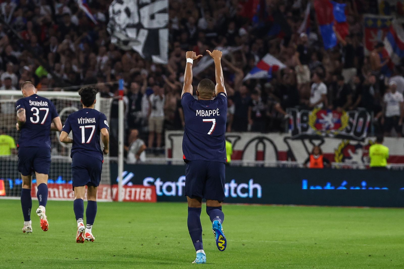 epa10838560 Paris Saint Germain's Kylian Mbappe celebrates after scoring the 0-1 goal during the French Ligue 1 soccer match between Olympique Lyonnais and Paris Saint-Germain in Decines-Charpieu, near Lyon, France, 03 September 2023.  EPA/MOHAMMED BADRA / POOL