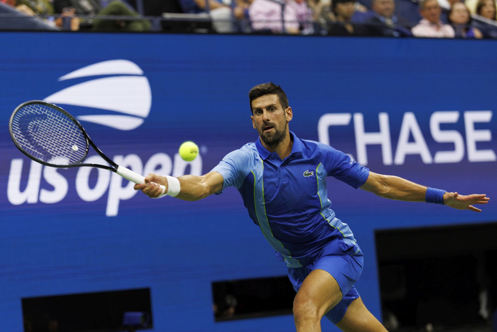 epa10838968 Novak Djokovic of Serbia returns the ball to Borna Gojo of Croatia during their fourth round match at the US Open Tennis Championships at the USTA National Tennis Center in Flushing Meadows, New York, USA, 03 September 2023. The US Open runs from 28 August through 10 September.  EPA/CJ GUNTHER