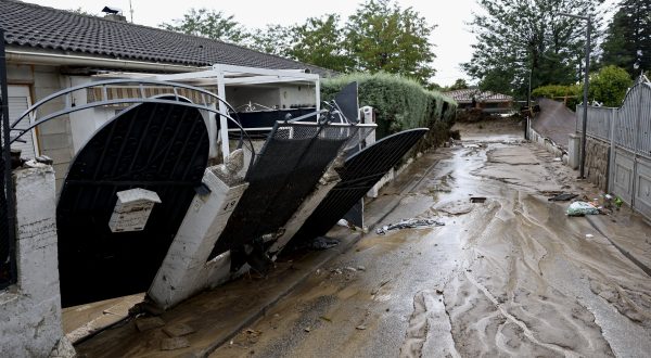 epa10839398 View of a damaged street in Aldea del Fresno after floods, Madrid, Spain, 04 September 2023. A 10-year-old boy was found alive up a tree hours after he and his father went missing while traveling with the mother and sister in a car. The family was surprised by floods in a car in Aldea del Fresno, one of the towns most affected by floods in Madrid region.  EPA/RODRIGO JIMENEZ