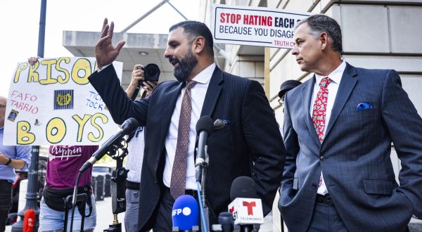 epa10842889 Nayib Hassan (C) and Sabino Jauregui (R), attorneys for ex-Proud Boys leader Enrique Tarrio, speak to the media after Tarrio was sentenced to 22 years for seditious conspiracy in Washington, DC, USA, 05 September 2023. Tarrio was found guilty in May 2024 for seditious conspiracy, among other felonies, for his role in the January 6 attacks on the US Capitol.  EPA/JIM LO SCALZO