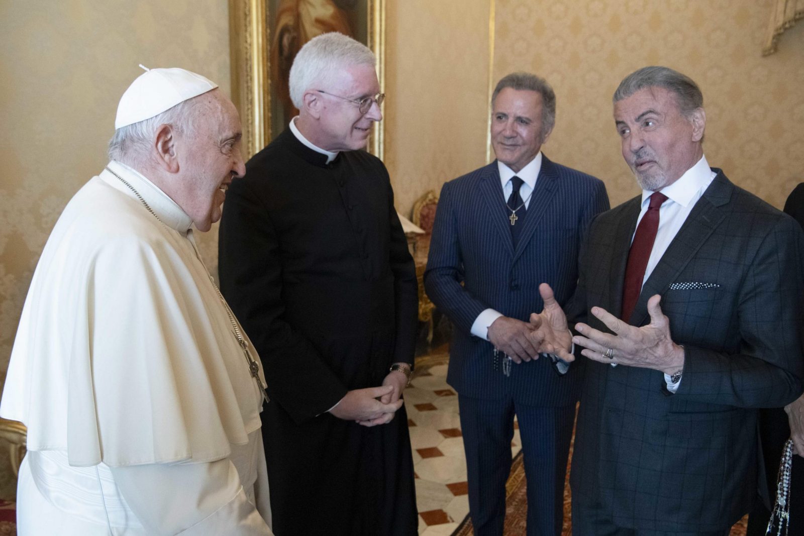epa10848065 A handout picture provided by the Vatican Media shows Pope Francis with actor and director Sylvester Stallone during a meeting in Vatican City, 8 September 2023.  EPA/VATICAN MEDIA HANDOUT  HANDOUT EDITORIAL USE ONLY/NO SALES