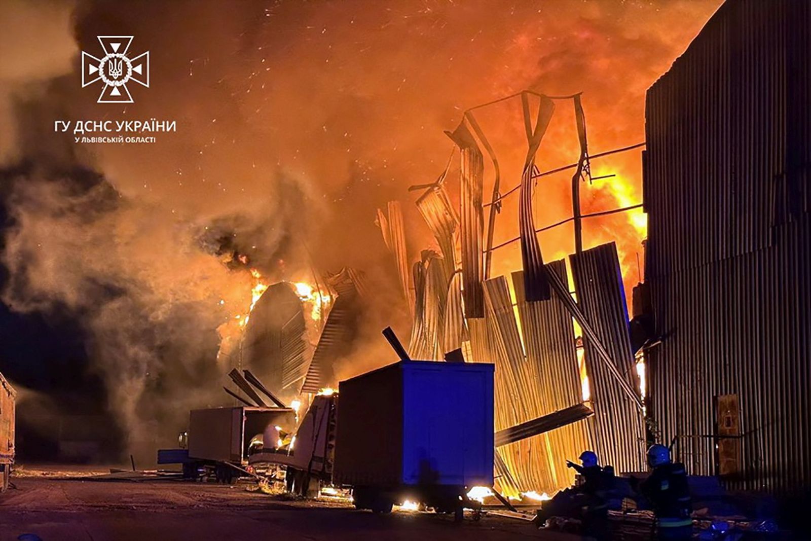 epa10869271 A handout photo made available by the State Emergency Service shows Ukrainian rescuers putting out a fire of industrial storage after shock drone debris fell on it, in the western Ukrainian city of Lviv, Ukraine, 19 September 2023 amid the Russian invasion. One person died and two injured during that attack as State Emergency Service reported. Ukraine was attacked overnight with 30 shock drones, 27 of which were shot down according to a statement from the Ukraine Air Force. Russian troops entered Ukrainian territory in February 2022, starting a conflict that has provoked destruction and a humanitarian crisis.  EPA/STATE EMERGENCY SERVICE HANDOUT  HANDOUT EDITORIAL USE ONLY/NO SALES