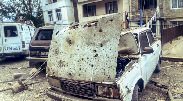 epa10869792 A handout photo made available by OC Media shows damage to residential buildings and vehicles in Stepnakert, Nagorno-Karabakh, 19 September 2023. Azerbaijan's Ministry of Defense announced on 19 September the launching of local 'anti-terrorism' measures against the Armenian military in the disputed Nagorno-Karabakh region in order to restore the constitutional order of Azerbaijan.  EPA/SARGSYAN/OC MEDIA HANDOUT HANDOUT EDITORIAL USE ONLY/NO SALES HANDOUT EDITORIAL USE ONLY/NO SALES