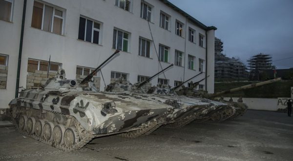epa10880648 BMP-2 Armored Personnel Carriers seized and received during the disarmament of Nagorno-Karabakh forces are displayed at an Azerbaijani forces' held position in Shusha, in the Azerbaijan-controlled region of Nagorno-Karabakh, late 23 September 2023 (issued 24 September 2023). On 19 September 2023, Azerbaijan broke a ceasefire agreement from a decades-old conflict by launching a brief military offensive on the contested region of Nagorno-Karabakh, a breakaway enclave internationally recognized as part of Azerbaijan that is home to some 120,000 ethnic Armenians. A new ceasefire was agreed upon in Nagorno-Karabakh on 20 September 2023, after a 24-hour military offensive. The armed forces of Nagorno-Karabakh began to surrender weapons and military equipment under the control of Russian peacekeepers. According to the military department of Azerbaijan, as part of the agreements reached on the cessation of hostilities, six units of armored vehicles, more than 800 units of small arms and anti-tank weapons and about 5,000 ammunition have already been handed over. An assistant to Azerbaijani leader Hikmet Hajiyev said that Nagorno-Karabakh military personnel who voluntarily lay down their arms during Azerbaijan's 'anti-terrorist operation' are free.  EPA/ROMAN ISMAYILOV