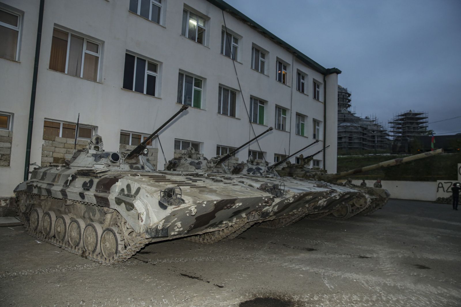 epa10880648 BMP-2 Armored Personnel Carriers seized and received during the disarmament of Nagorno-Karabakh forces are displayed at an Azerbaijani forces' held position in Shusha, in the Azerbaijan-controlled region of Nagorno-Karabakh, late 23 September 2023 (issued 24 September 2023). On 19 September 2023, Azerbaijan broke a ceasefire agreement from a decades-old conflict by launching a brief military offensive on the contested region of Nagorno-Karabakh, a breakaway enclave internationally recognized as part of Azerbaijan that is home to some 120,000 ethnic Armenians. A new ceasefire was agreed upon in Nagorno-Karabakh on 20 September 2023, after a 24-hour military offensive. The armed forces of Nagorno-Karabakh began to surrender weapons and military equipment under the control of Russian peacekeepers. According to the military department of Azerbaijan, as part of the agreements reached on the cessation of hostilities, six units of armored vehicles, more than 800 units of small arms and anti-tank weapons and about 5,000 ammunition have already been handed over. An assistant to Azerbaijani leader Hikmet Hajiyev said that Nagorno-Karabakh military personnel who voluntarily lay down their arms during Azerbaijan's 'anti-terrorist operation' are free.  EPA/ROMAN ISMAYILOV