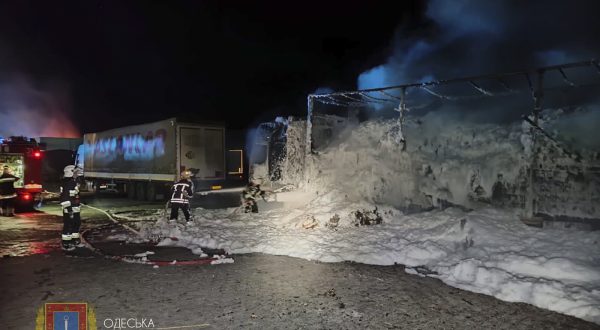 epa10883297 A handout photo made available by the Odesa Regional State Administration shows rescuers working to put down a fire after an overnight attack of a seaport infrastructure object in the Odesa region, southern Ukraine, 26 September 2023. At least two people were injured in the attack according to Oleg Kiper, the Head of Odesa Regional State Administration. Russian troops entered Ukrainian territory in February 2022, starting a conflict that has provoked destruction and a humanitarian crisis.  EPA/ODESA REGIONAL STATE ADMINISTRATION / HANDOUT HANDOUT  HANDOUT EDITORIAL USE ONLY/NO SALES
