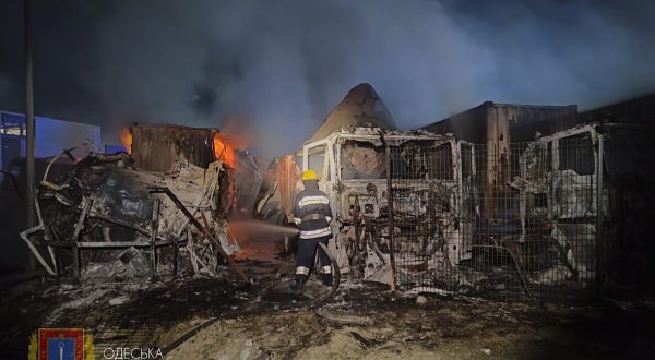 epa10883296 A handout photo made available by the Odesa Regional State Administration shows rescuers working to put down a fire after an overnight attack of a seaport infrastructure object in the Odesa region, southern Ukraine, 26 September 2023. At least two people were injured in the attack according to Oleg Kiper, the Head of Odesa Regional State Administration. Russian troops entered Ukrainian territory in February 2022, starting a conflict that has provoked destruction and a humanitarian crisis.  EPA/ODESA REGIONAL STATE ADMINISTRATION / HANDOUT HANDOUT  HANDOUT EDITORIAL USE ONLY/NO SALES