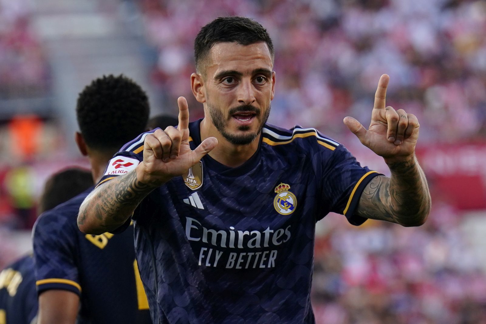 epa10892431 Real Madrid's Joselu celebrates after scoring the 0-1 goal during the Spanish LaLiga match between Girona FC and Real Madrid at Montilivi stadium in Girona, Spain, 30 September 2023.  EPA/Siu Wu