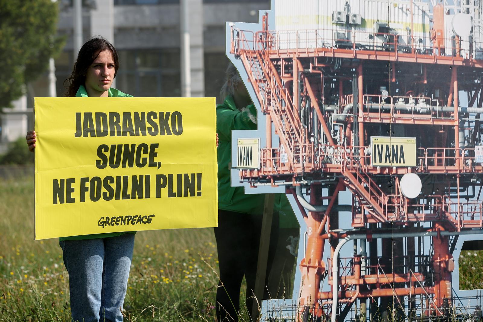 05.07.2023., Zagreb - Akcija aktivista Greenpeacea kojom su upozorili na curenje metana iz devet platformi na sjevernom Jadranu ispred zgrade INE. Photo: Igor Kralj/PIXSELL