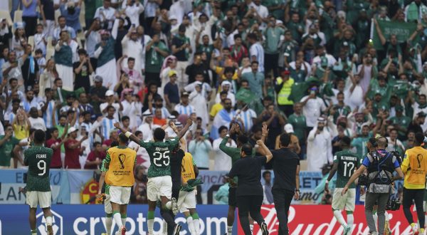 LUSAIL, QATAR - NOVEMBER 22: Players of Saudi Arabia celebrates the winning with fans after the 2022 FIFA World Cup Qatar group C between Argentina and Saudi Arabia at Lusail Stadium on November 22, 2022 in Lusail, Qatar. (Photo by Florencia Tan Jun/PxImages/Icon Sportswire) (Icon Sportswire via AP Images)