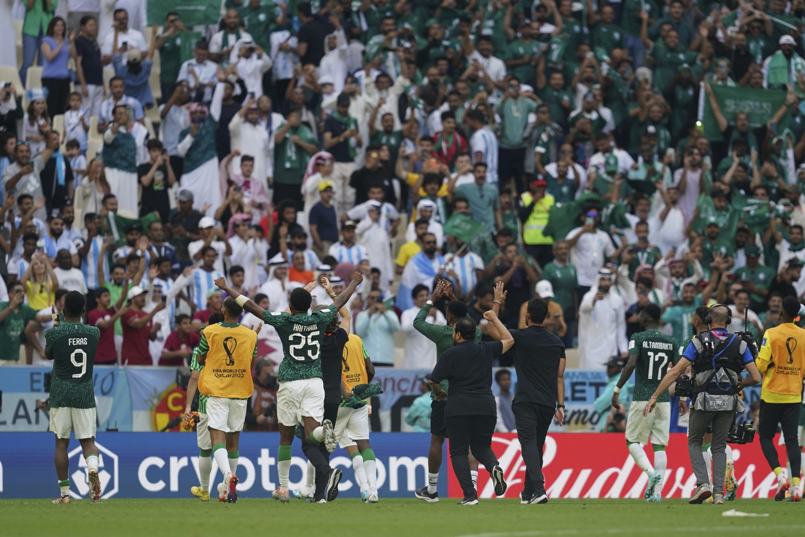 LUSAIL, QATAR - NOVEMBER 22: Players of Saudi Arabia celebrates the winning with fans after the 2022 FIFA World Cup Qatar group C between Argentina and Saudi Arabia at Lusail Stadium on November 22, 2022 in Lusail, Qatar. (Photo by Florencia Tan Jun/PxImages/Icon Sportswire) (Icon Sportswire via AP Images)