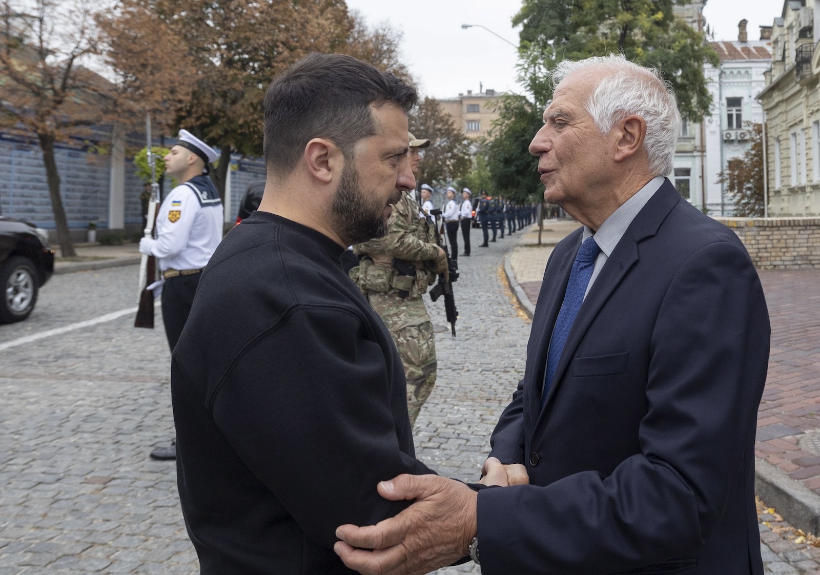 epa10893829 A handout photo made available by Presidential Press Service shows Ukrainian President Volodymyr Zelensky (L) and EU High Representative for Foreign Affairs and Security Policy Josep Borrell (R) attend a ceremony to honor the memory of Ukrainian soldiers who gave their lives defending their Motherland near the Memory wall of fallen defenders of Ukraine in Russian-Ukrainian war in downtown Kyiv, Ukraine, 01 October 2023. Ukrainians mark on 01 October 2023 three different celebrations: the Day of Defenders of Ukraine, the Day of the Ukrainian Cossacks and the Feast of the Intercession of the Holy Mother of God.  EPA/PRESIDENTIAL PRESS SERVICE / HANDOUT  HANDOUT EDITORIAL USE ONLY/NO SALES